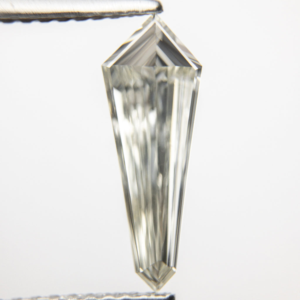 0.78ct 14.01x5.14x2.07mm VVS I/J Kite Step Cut 18339-01 hold D1680