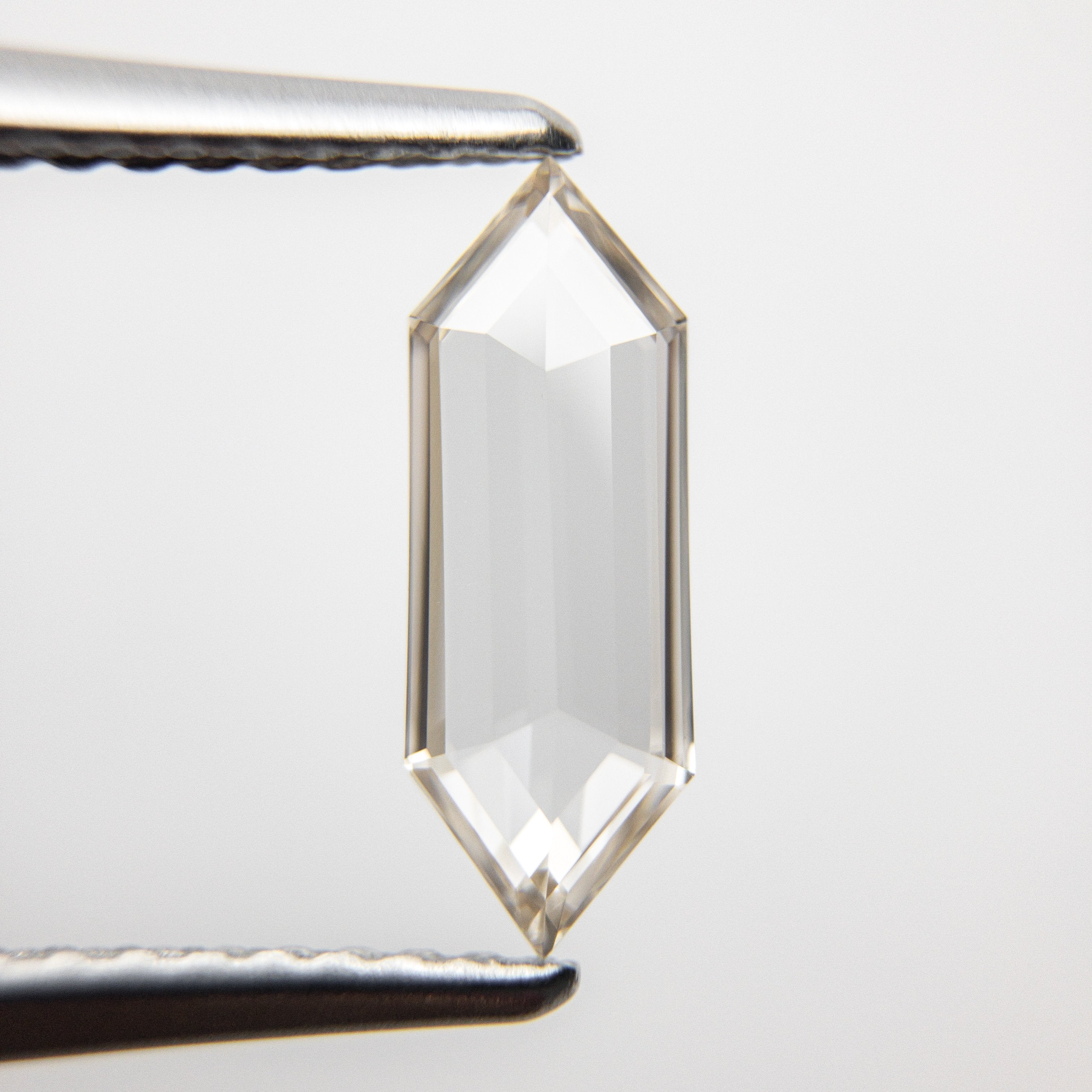0.69ct 11.07x4.06x1.61mm Hexagon Rosecut 18369-02 hold D1522