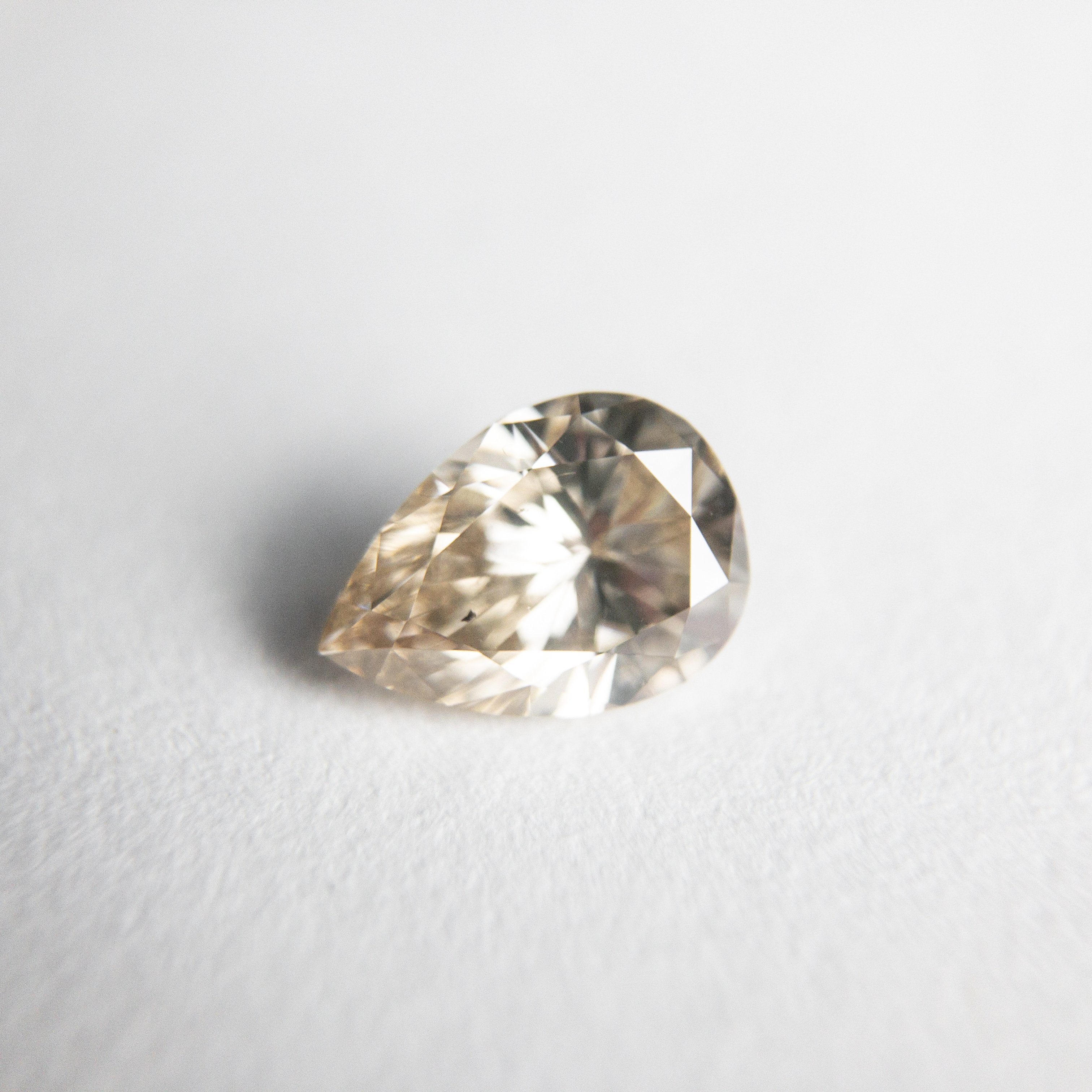 0.62ct 6.77x4.82x3.03mm Pear Brilliant 18369-32 HOLD D1630