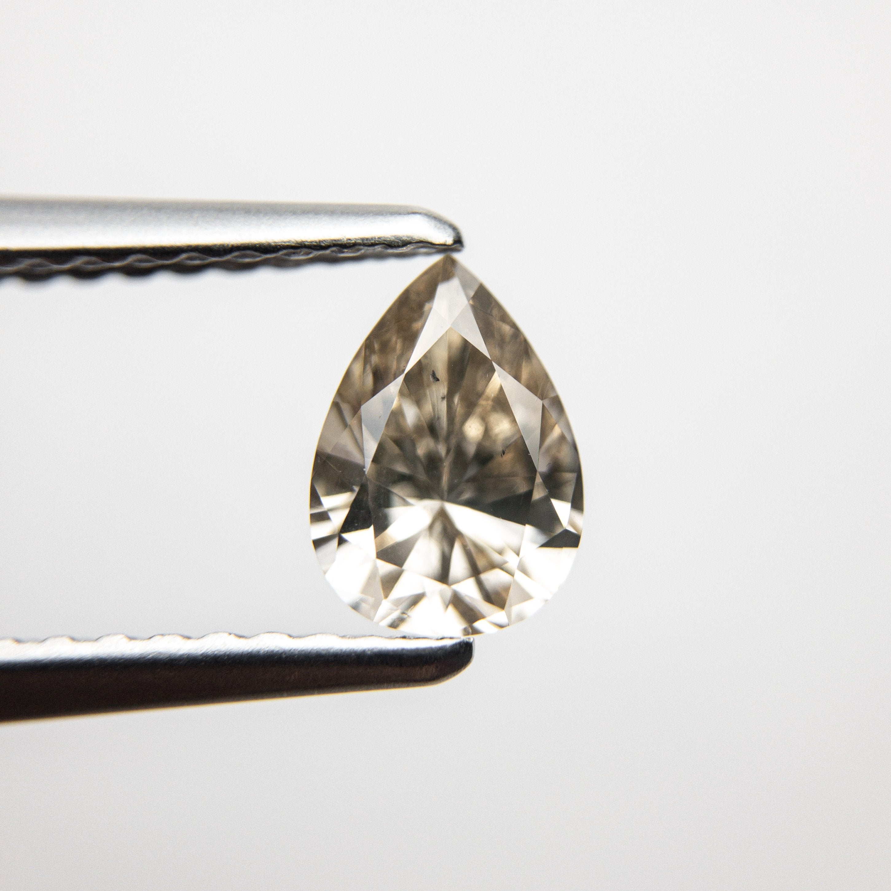 0.62ct 6.77x4.82x3.03mm Pear Brilliant 18369-32 HOLD D1630