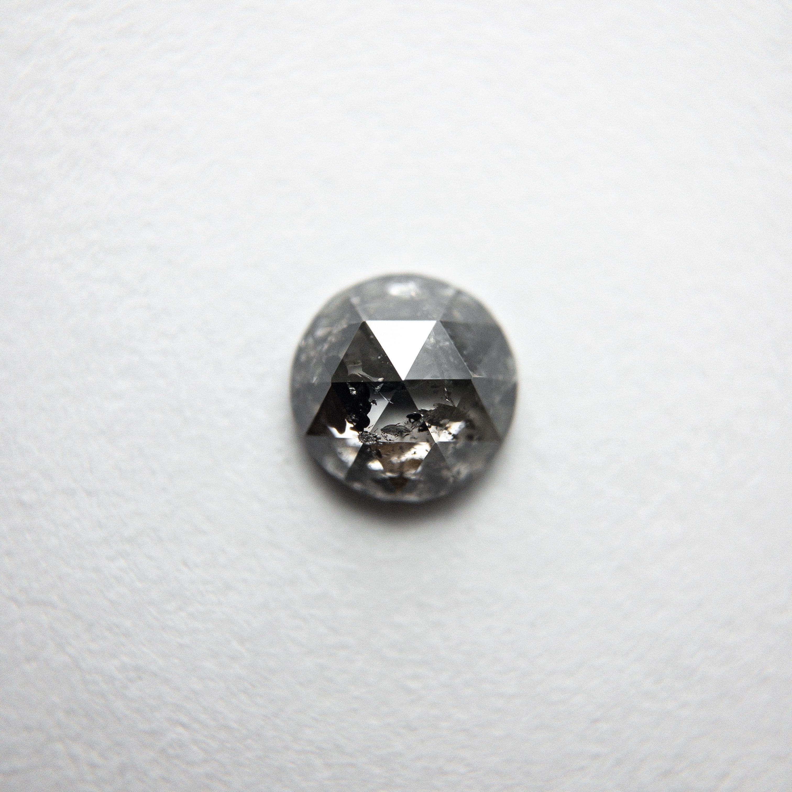 0.61ct 5.55x5.50x2.43mm Round Rosecut 18434-15 hold D1822