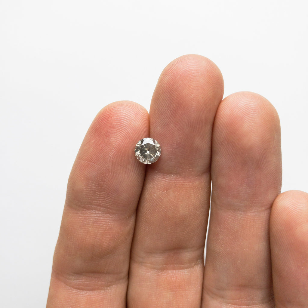 1.06ct 6.30x6.27x4.06mm Round Brilliant 18447-04 hold D1684