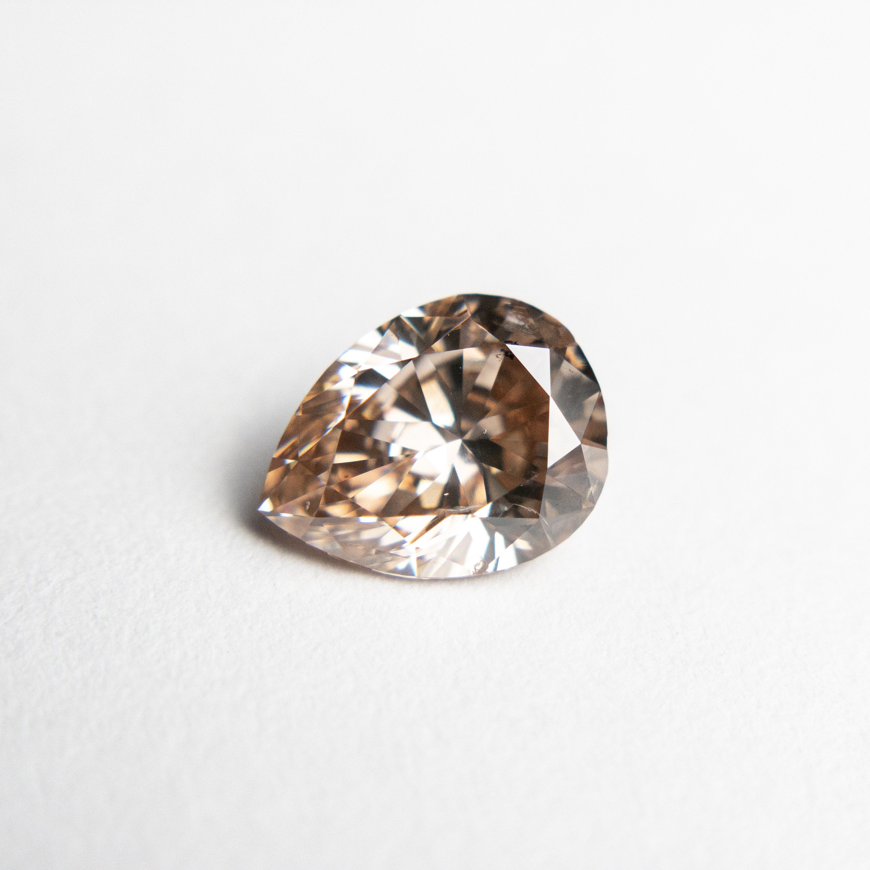 1.06ct 7.73x5.92x3.64mm Argyle GIA I1 Fancy Brown Pink Pear Brilliant 18562-01 HOLD D1922