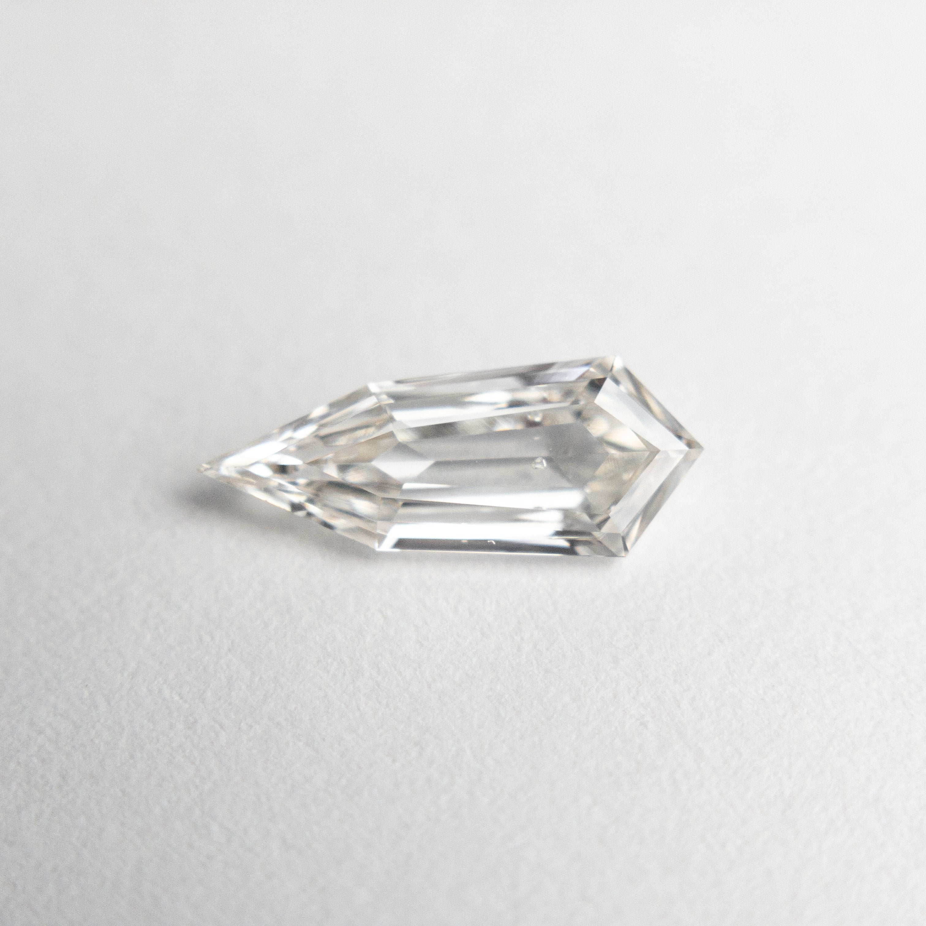 0.64ct 10.16x4.06x2.18mm SI2 H-I Shield Step Cut 18662-01