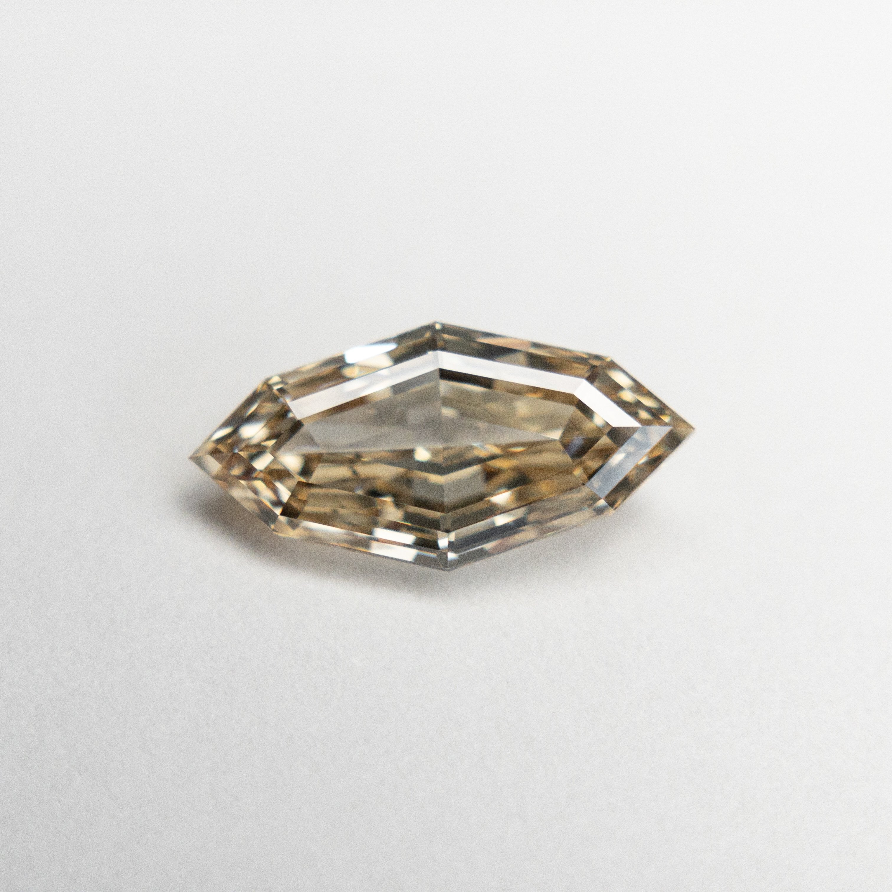1.08ct 10.49x5.21x2.84mm SI1 Champagne Step Cut Marquise 18839-03