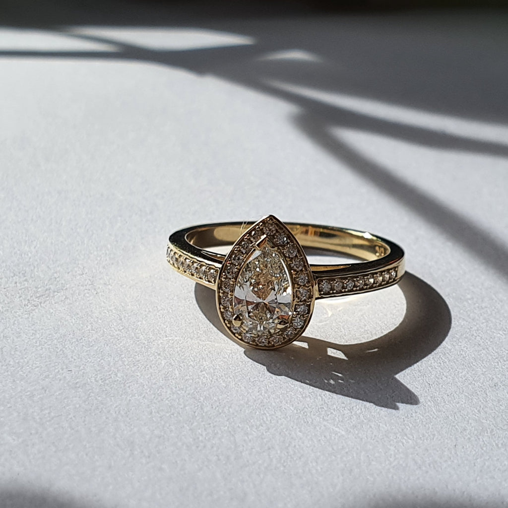 SALE - GIA certified White Diamond Pear Halo Ring