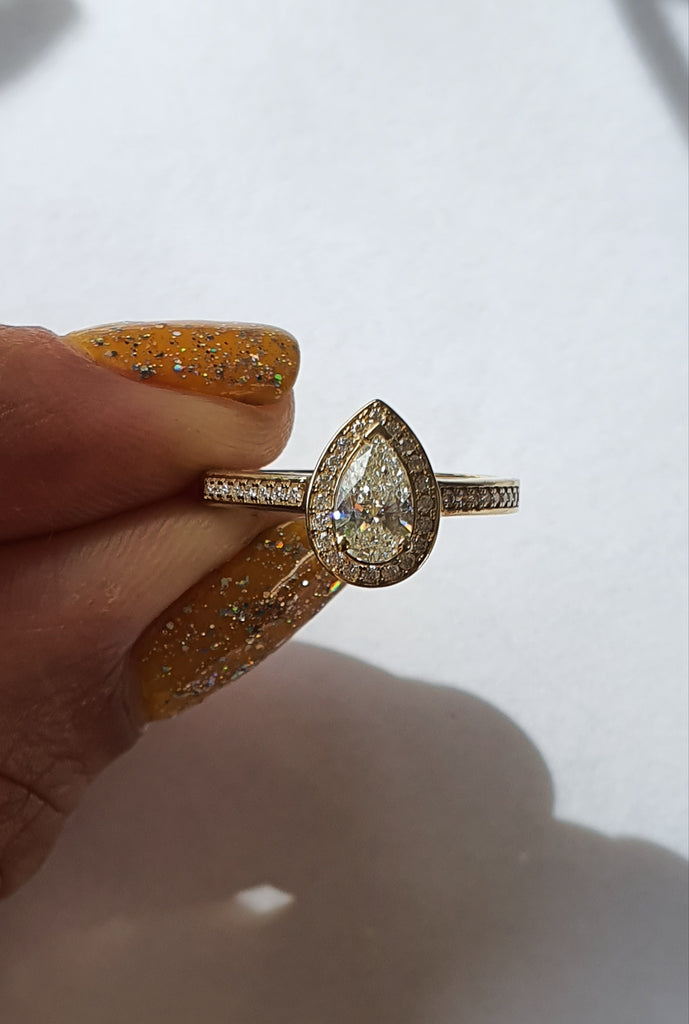 SALE - GIA certified White Diamond Pear Halo Ring