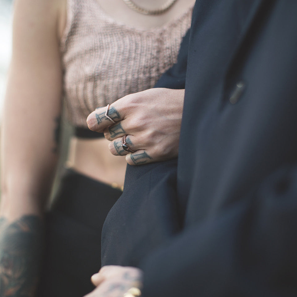 Bride and groom with wedding bands from Windfall Jewellery