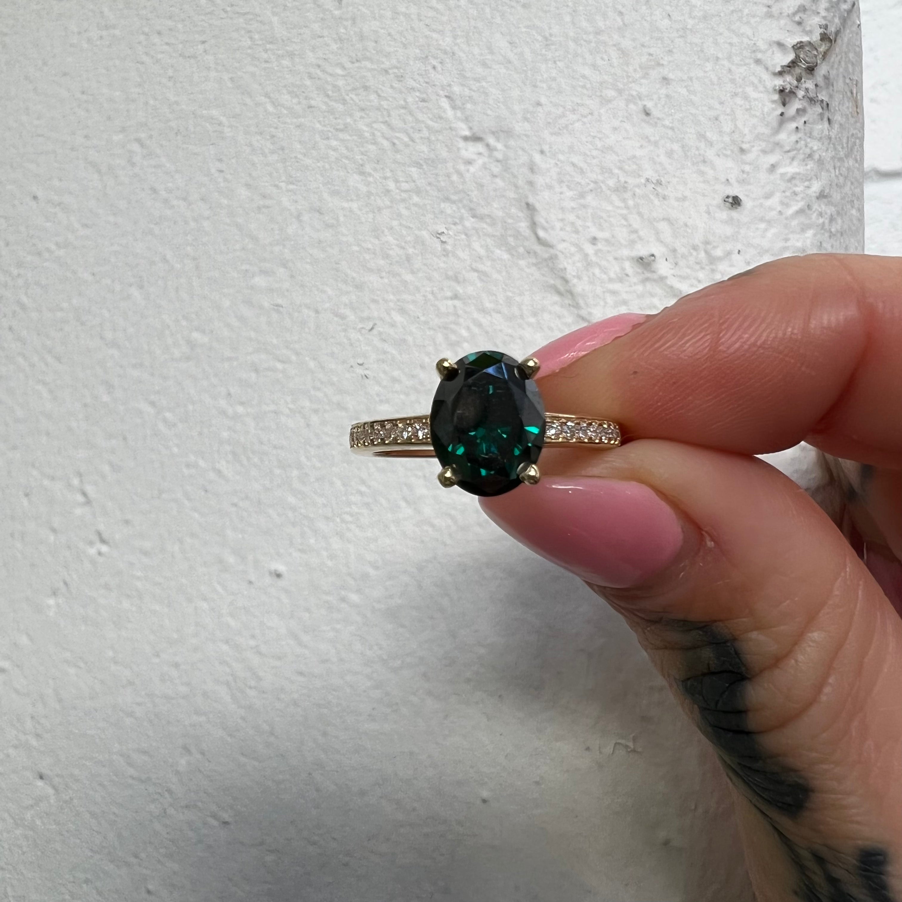 Green sales oval ring