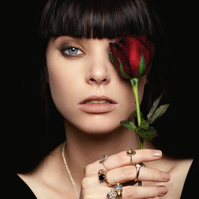 Windfall Jewellery The Bitter End skull ring with deep red gemstone set in rose gold — unique handcrafted gothic-inspired jewellery for men and women