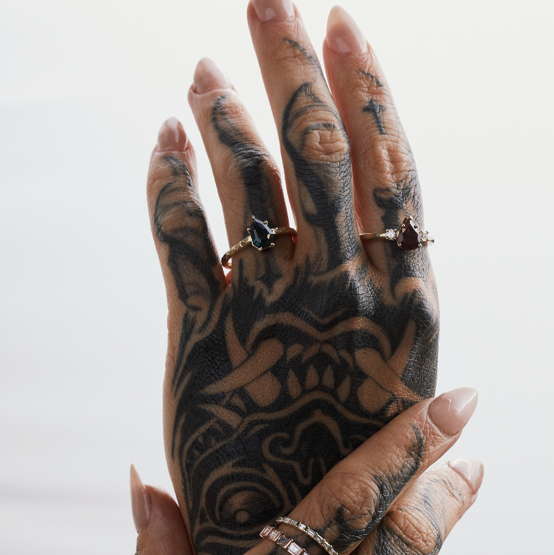 hammered band on a pear shaped sapphire handmade in melbourne