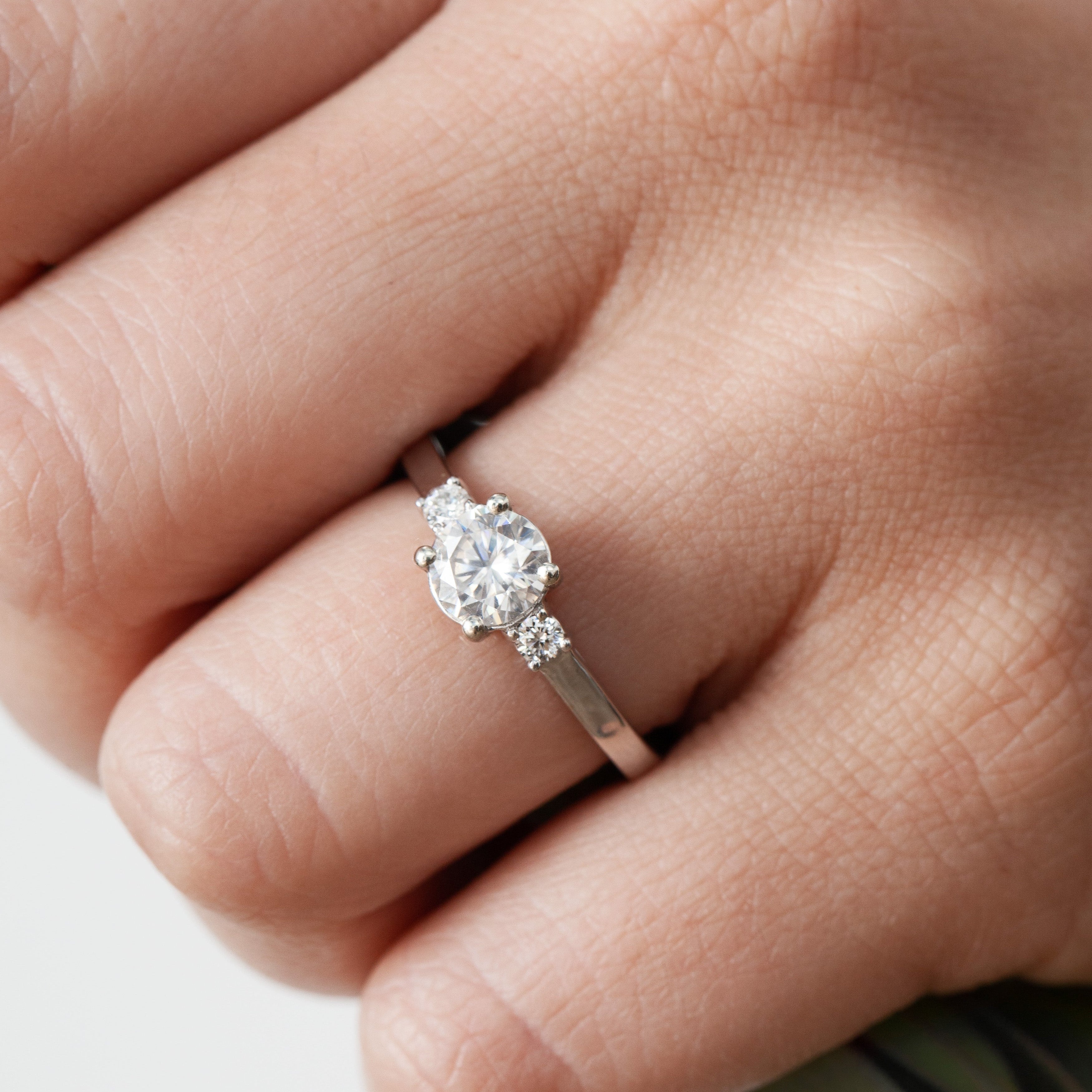 three diamond ring trinity style white gold  on hand