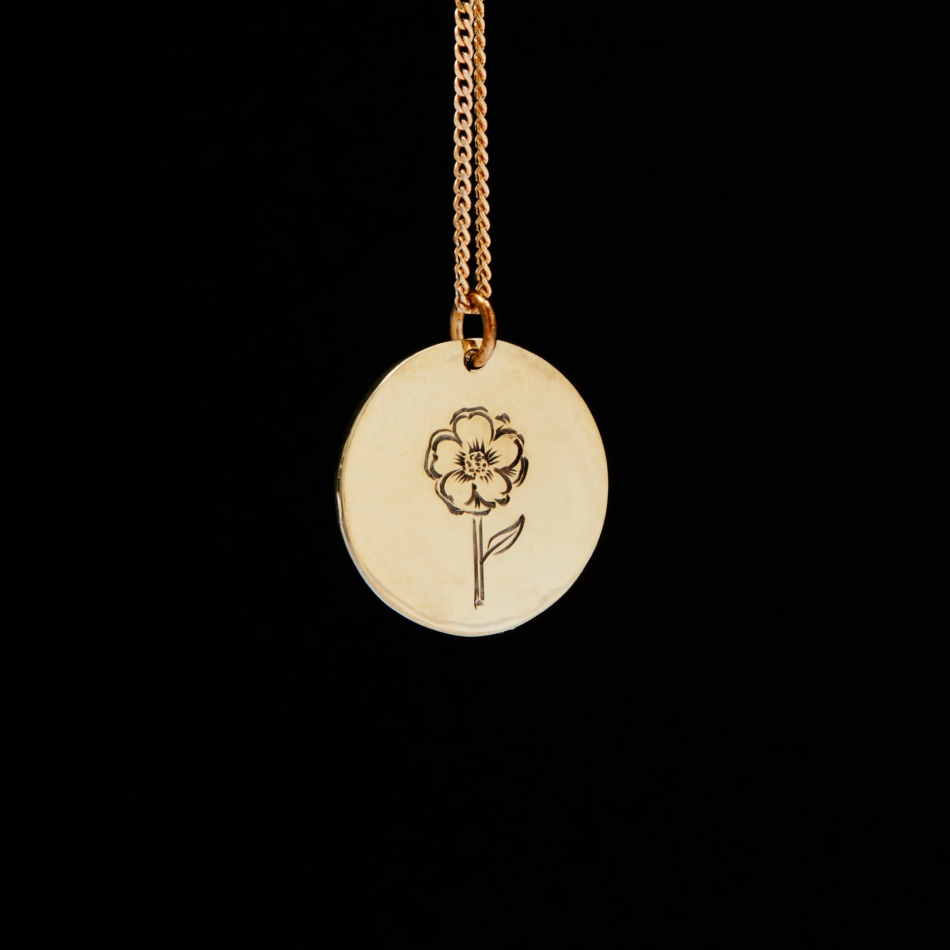 yellow gold pendant with hand engraved rose
